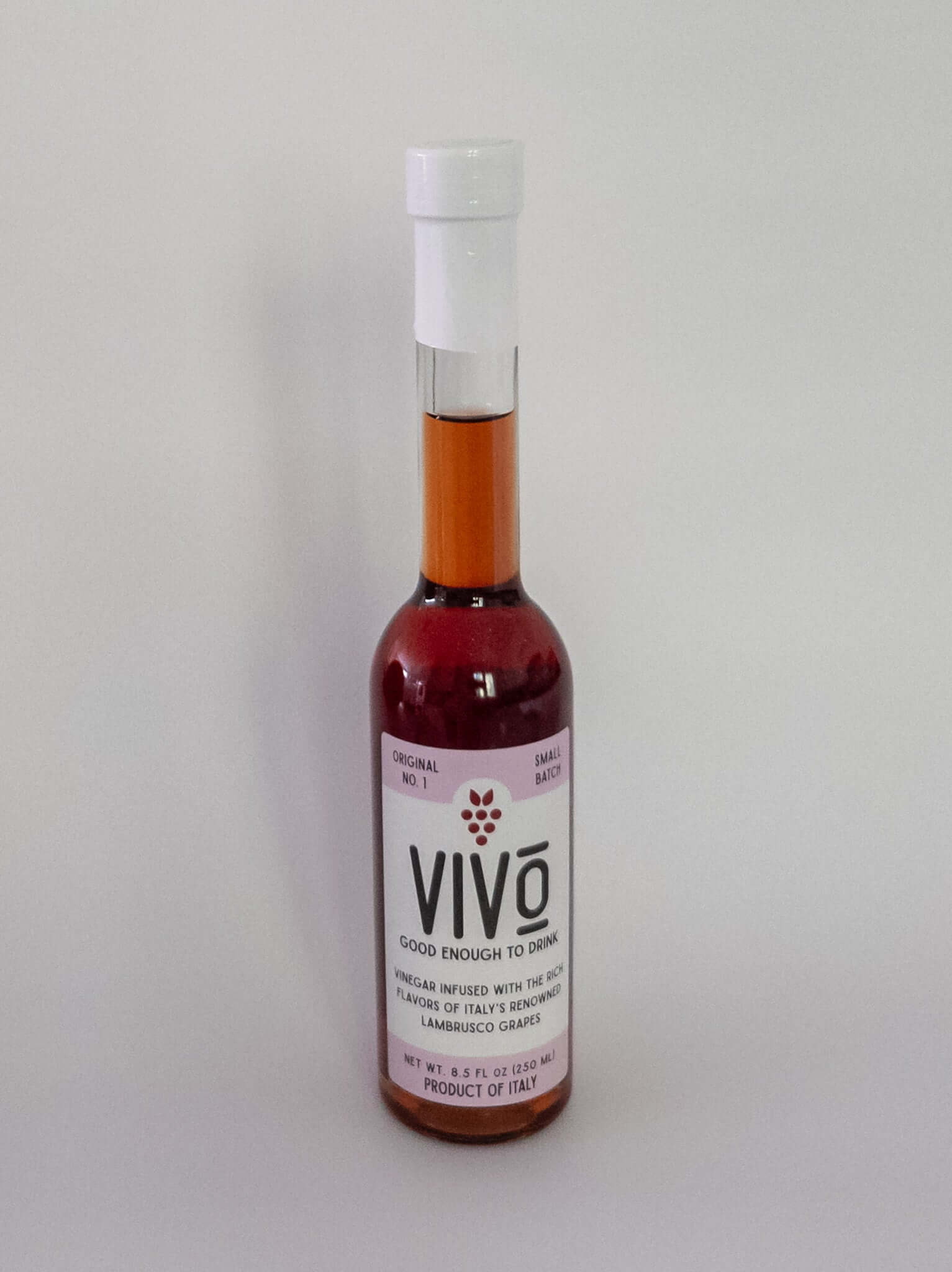 VIVO lambrusco vinegar bottle showcasing authentic Italian craftsmanship from pure Lambrusco grapes.