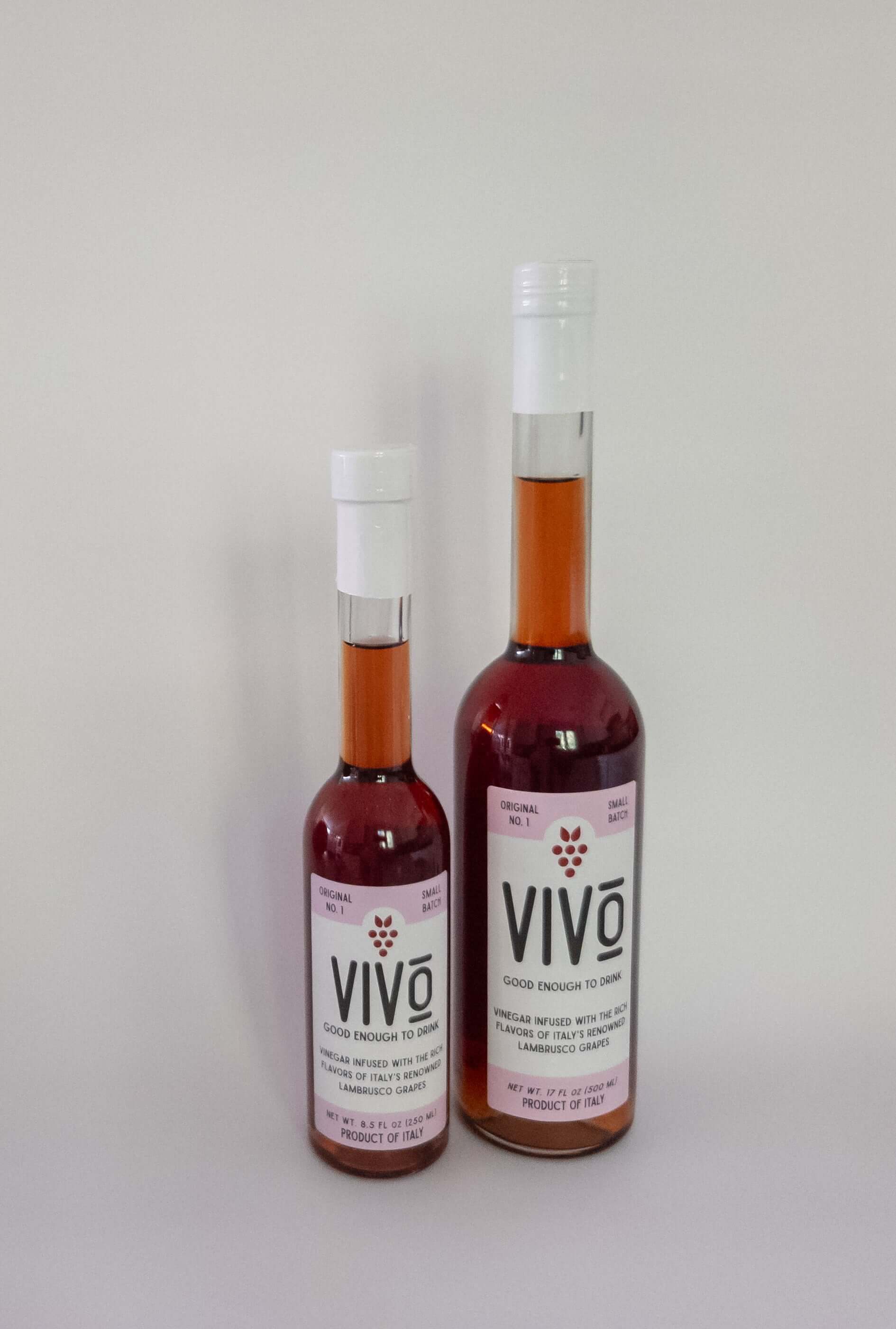 VIVO lambrusco vinegar bottles showcasing premium Italian craftmanship from Emilia-Romagna.